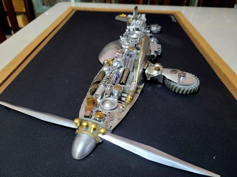 Quadro do Avião P-51 Mustang em 3D feito em metal reciclável de eletrônicos.