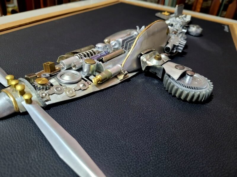 Quadro do Avião P-51 Mustang em 3D feito em metal reciclável de eletrônicos.